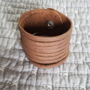 Brown leather slit cuff